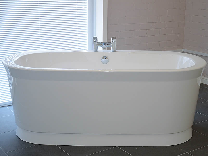 The Artesia free standing bath, pictured on its dedicated plinth