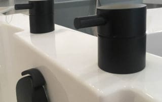 Cifial Black Deck Valves and Aqua Filler displayed on our showroom Nirvana Deep Soaking Tub