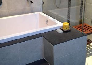 View of the Calyx 1230 installed beside the shower cubicle. Vancouver, Canada.