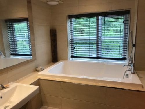 The Nirvana deep soaking tub - installed in a narrow bathroom alcove