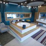 In this TV studio setting, the bath is inset into a raised wooden deck.