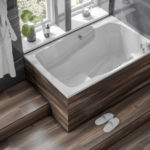 The Takara easy-access deep soaking tub, with wooden surround and step.